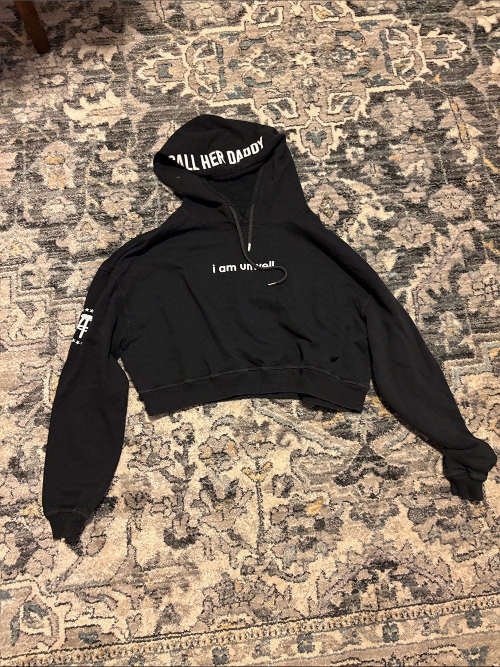 Women's Black Cropped Graphic Hoodie - 'I am unwell'